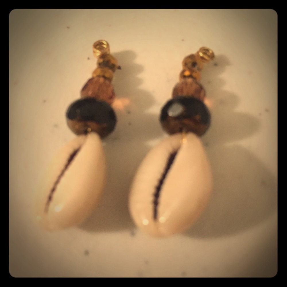 One of a kind handmade cowry shell earrings.